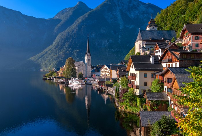 Hallstatt village on a lake with mountains in Austria