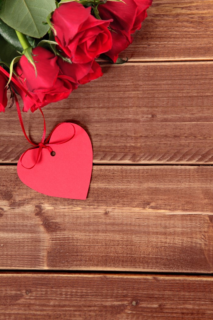 Red Roses and Heart Tag on Wood