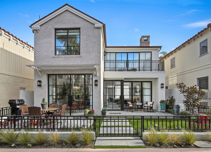 Modern White Brick House with Outdoor Patio