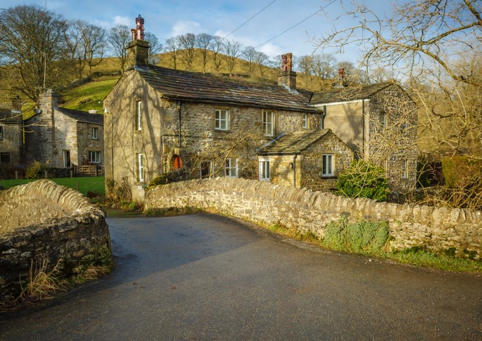 Stone houses and a stone bridge in Kettlewell, England