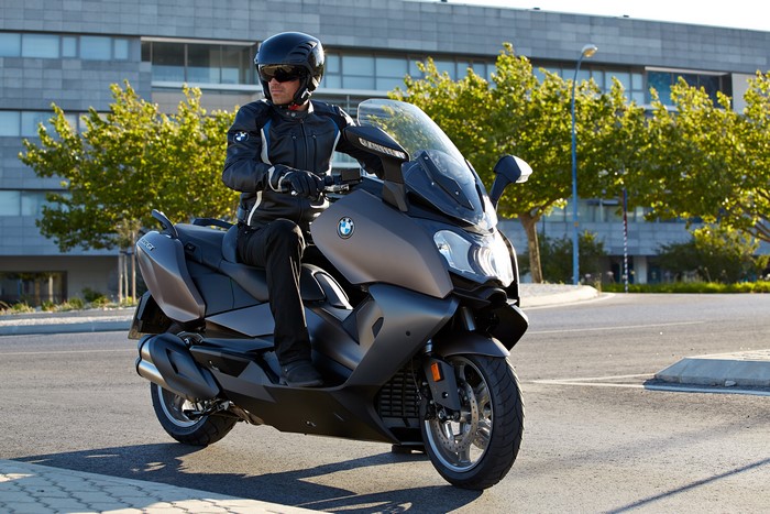 Man riding a BMW C 650 GT scooter
