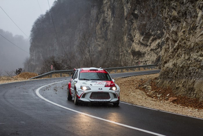 Lada Kalina RC rally car on a wet mountain road