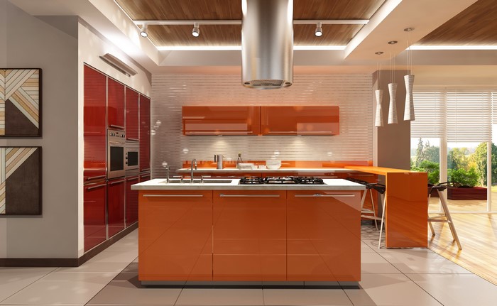 Modern kitchen with orange and red cabinets