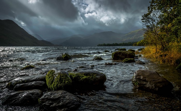 Stormy Evening over a Rocky Lake Shore