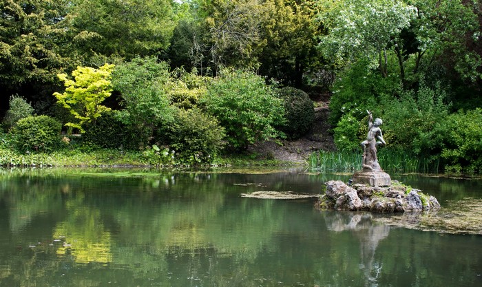 Thornbridge Hall gardens pond with sculpture