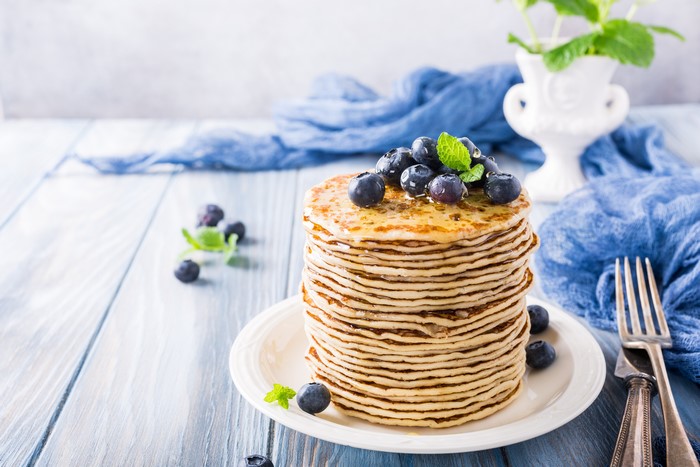 Stack of Pancakes with Blueberries and Mint