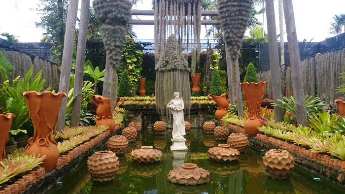 Sculpture in a garden pond at Nong Nooch Tropical Botanical Garden, Thailand