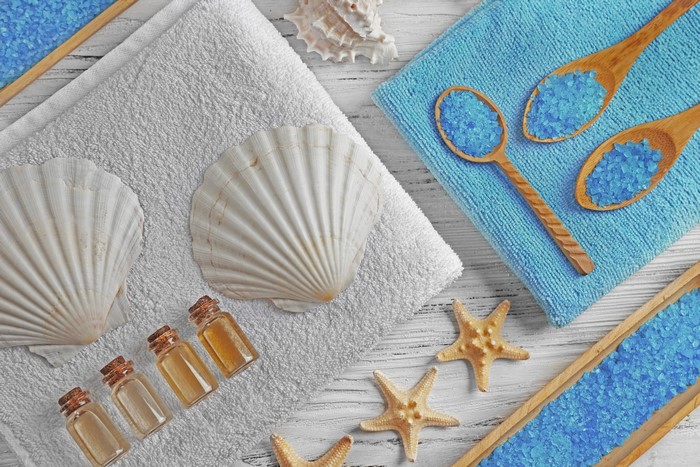Spa items with shells and blue salt