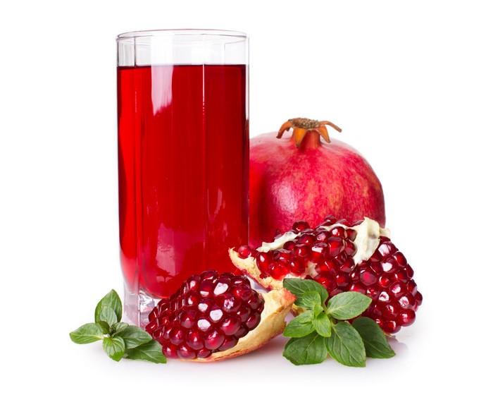 Pomegranate juice with pomegranates and mint