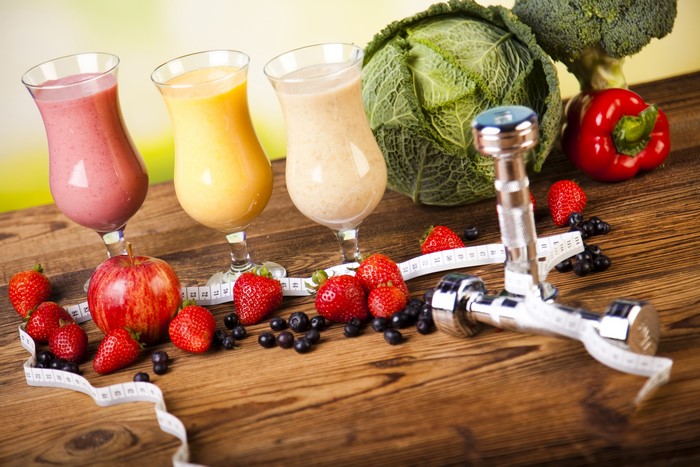 Healthy Smoothies, Fruits, Vegetables, and Dumbbells