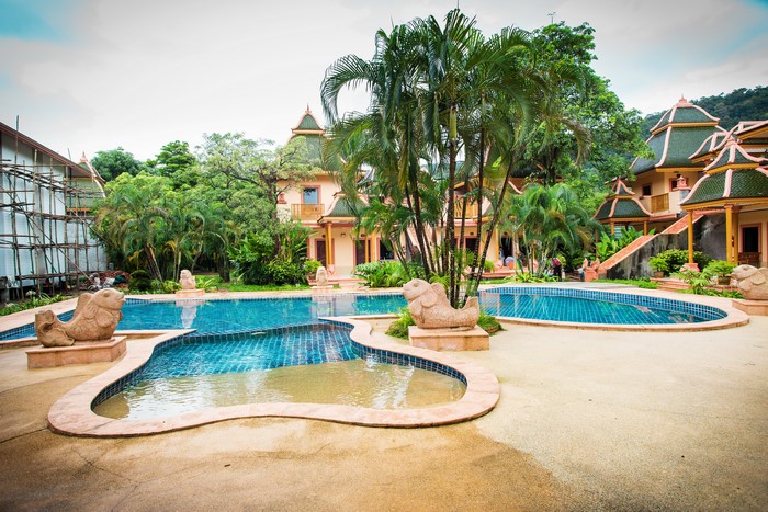 Tropical resort with pools and palm trees