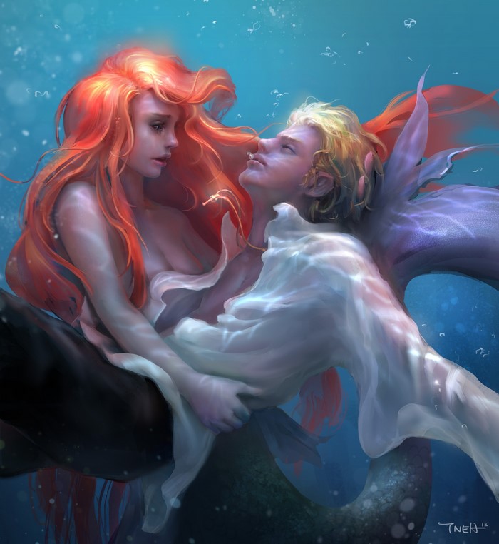 Mermaid couple embracing underwater