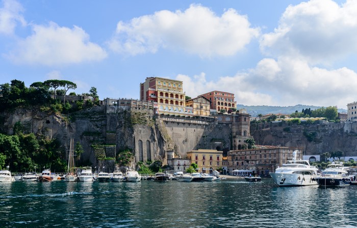 Sorrento, Italy Marina with Cliffside Buildings and Yachts