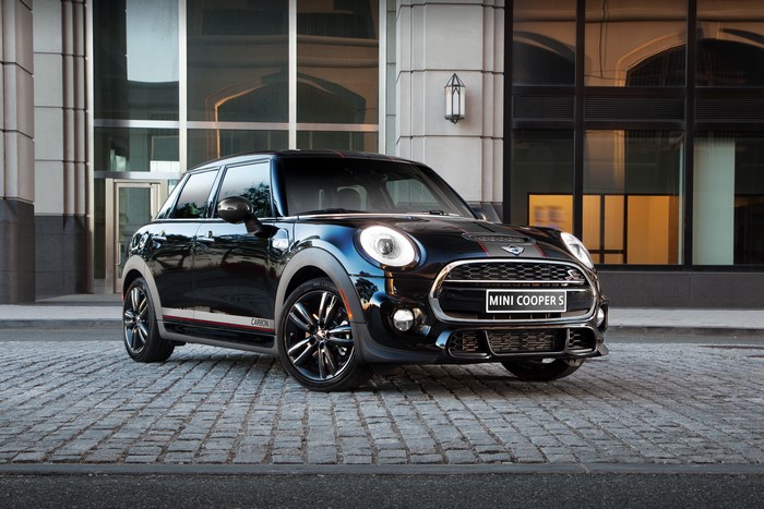 Black Mini Cooper S F56 on Cobblestone Street