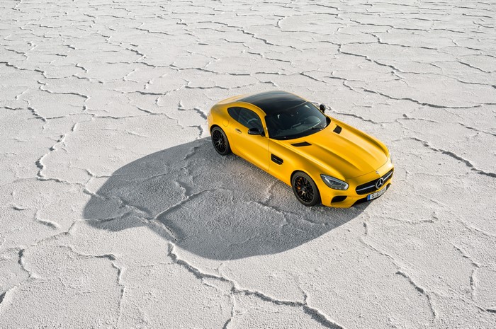 Yellow Mercedes-Benz AMG GT S on salt flats