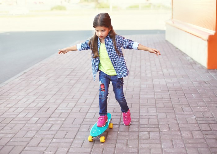 Girl riding a skateboard