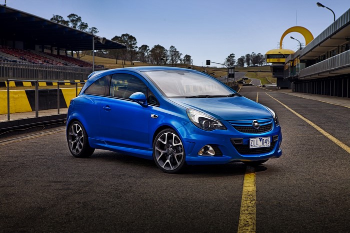 Blue Opel Corsa OPC 2013 on a Race Track