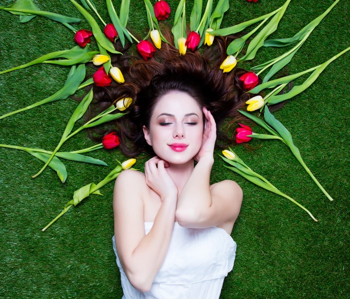 Woman with Tulips on Grass