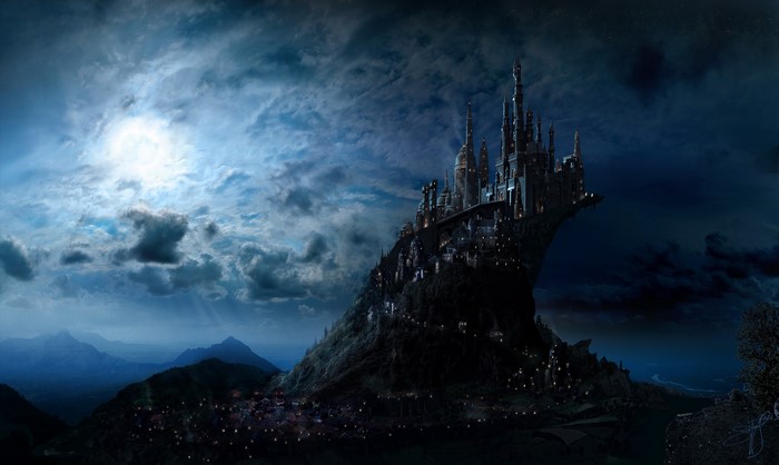 Castle on a mountain under a cloudy night sky