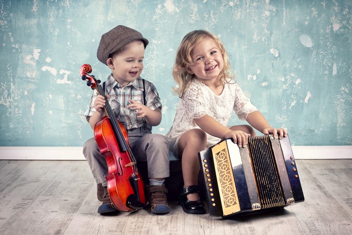 Boy with Violin and Girl with Accordion