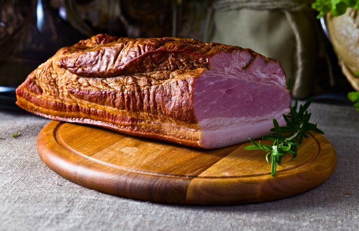 Smoked Ham on a Wooden Cutting Board