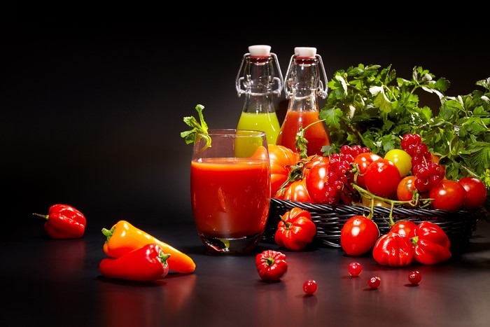 Tomatoes, Bell Peppers, and Juice with Black Background