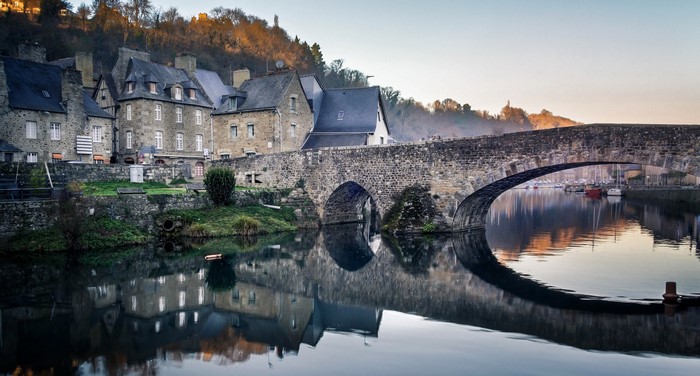Stone bridge over a river in Dinan, Brittany, France