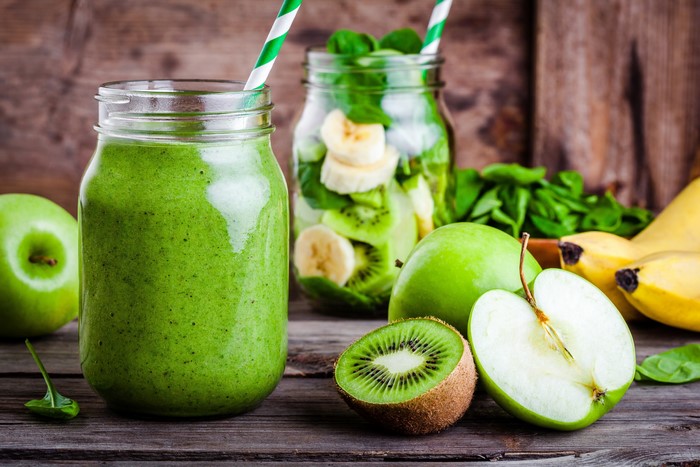Green smoothie with kiwi, apples, and bananas