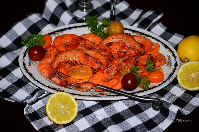 Plate of Shrimp with Lemons and Tomatoes