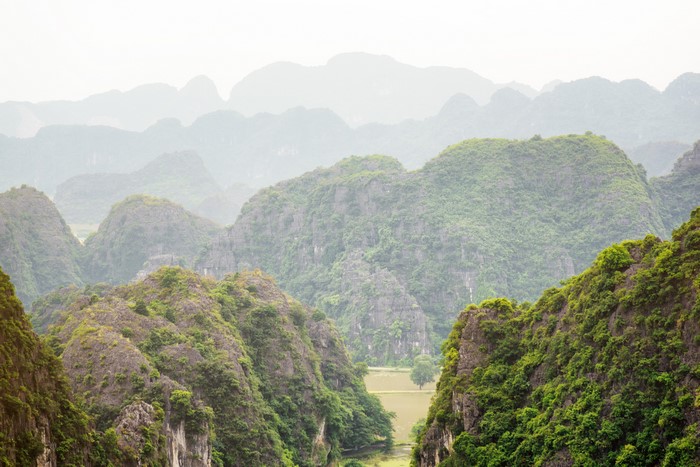 Misty Mountains and Green Valleys in Ninh Binh Province, Vietnam