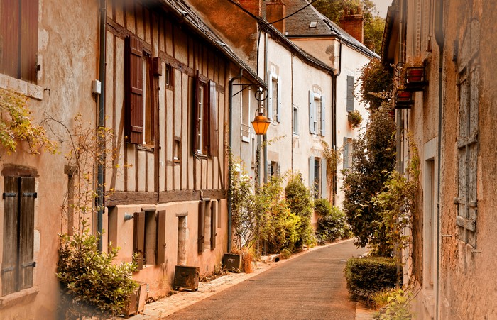 Street in Beaugency, France with Houses and Street Lights