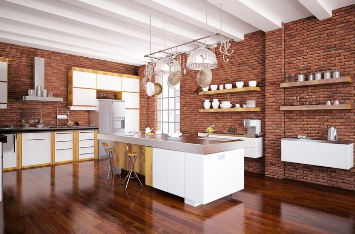 Modern kitchen with brick walls and island