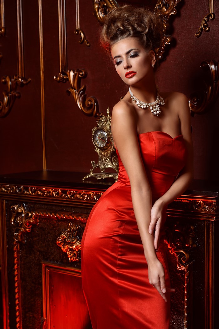 Woman in Red Dress with Jewelry