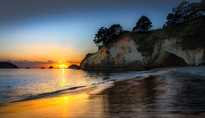 Sunset over the coast at Hahei, New Zealand