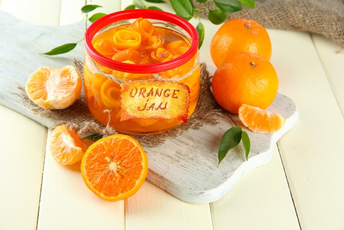 Orange Jam in a Jar with Oranges