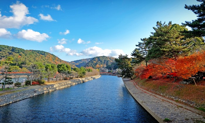 Canal in Kyoto, Japan with autumn foliage