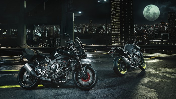 Two Yamaha MT-10 Touring Package motorcycles at night
