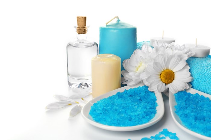 Spa items: candles, salt, oil, and flowers
