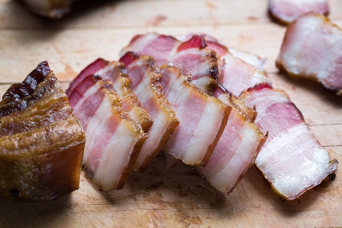 Sliced Salo on a Wooden Board