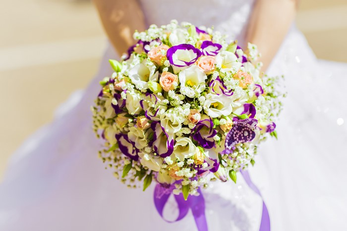 Wedding bouquet with roses and eustoma