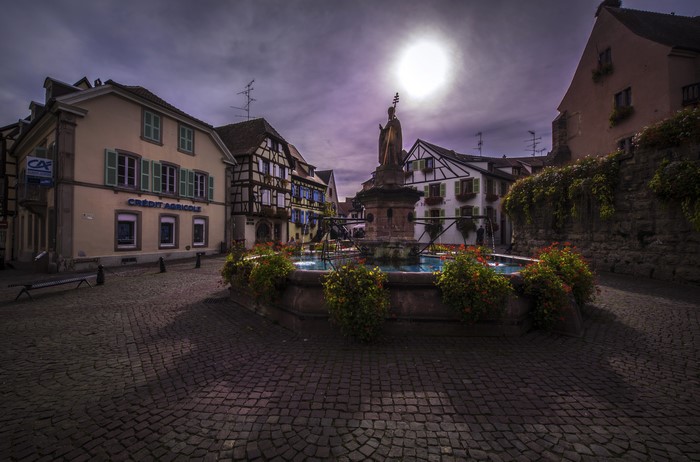 Fountain and Houses in Eguisheim, Alsace, France