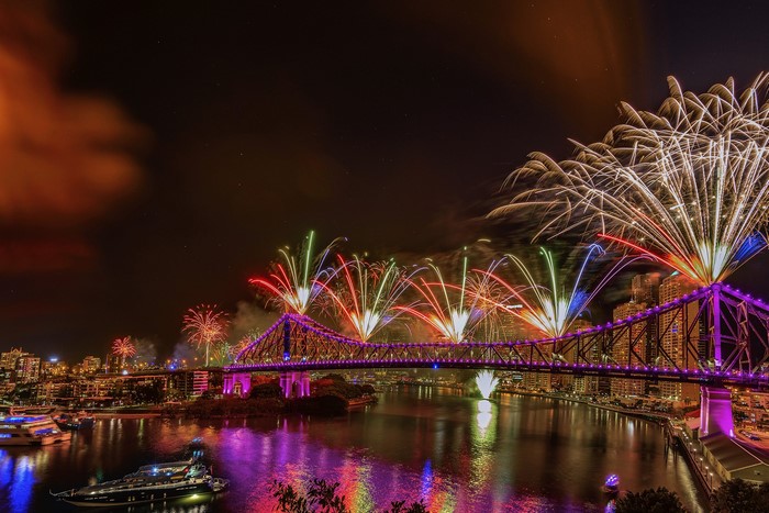 Fireworks over Brisbane River and Story Bridge at night