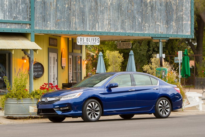 Blue 2017 Honda Accord Hybrid parked in front of Los Olivos General Store