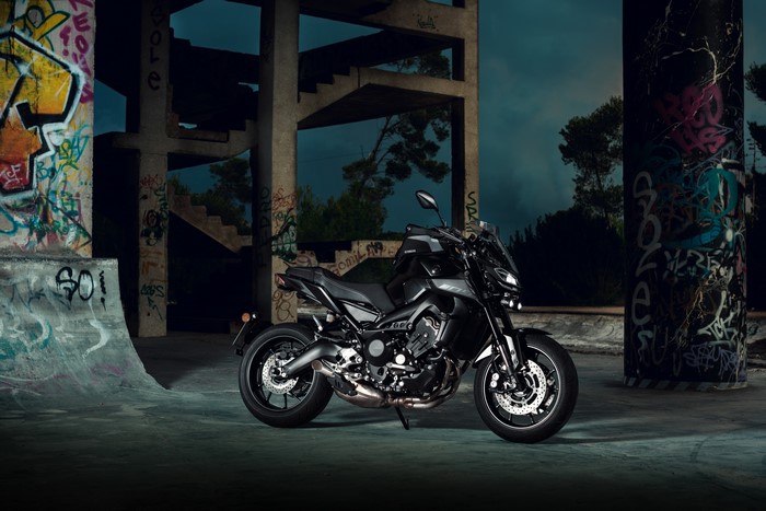 Black Yamaha MT-09 Motorcycle in Graffiti-Covered Urban Setting