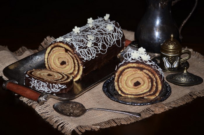 Chocolate Swiss Roll Cake with White Chocolate Decoration