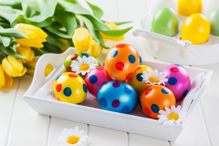 Easter Eggs and Yellow Tulips on White Tray