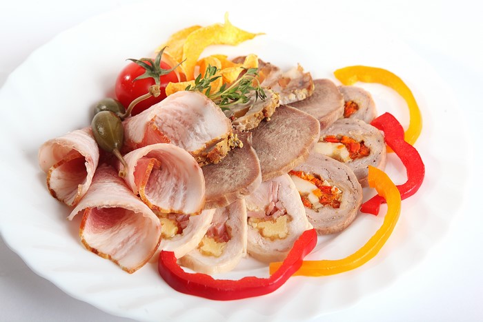 Meat platter with ham, tongue, and stuffed rolls