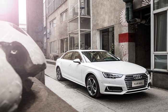 White Audi A4L 45 TFSI quattro (B8) parked