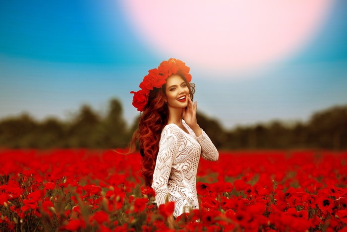 Woman with Poppy Wreath in Poppy Field