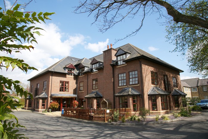 Brick building with dormer windows in York, England